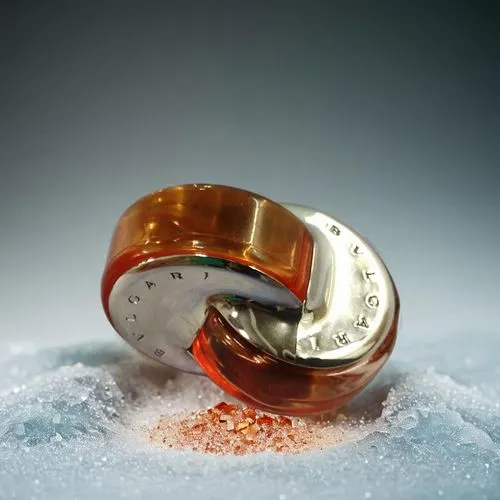 a ring is sitting in the snow and has been frozen,iron ring,wedding ring,snow ring,circular ring,wedding rings,ring with ornament