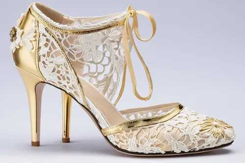 Create a luxurious high-heeled shoe with elegant gold accents and intricate lace detailing.,bridal shoe,bridal shoes,wedding shoes,cinderella shoe,gold filigree,flapper shoes,high heeled shoe,stiletto