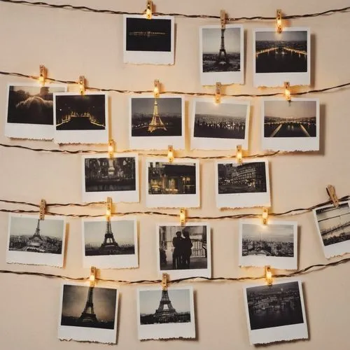 photos on clothes line,pictures on clothes line,photo corner,string lights,polaroid photos,eiffel tower,Photography,Documentary Photography,Documentary Photography 03