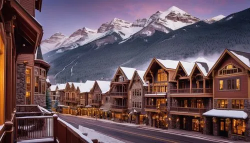 Victorian-era inspired, Telluride style building, mountain town, Colorado, rugged stone walls, steeply pitched roofs, wooden balconies, ornate facades, intricate stonework, snow-capped peaks in backgr