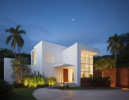 WATERFALL WALL,a contemporary house with light from overhead lights,modern house,mayakoba,modern architecture,residencial,tropical house,holiday villa