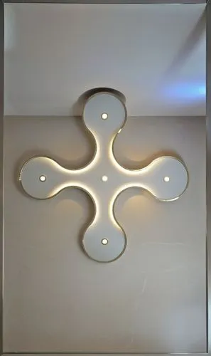 Gypsum decoration in the ceiling of a room with hidden LED lighting,decorative wall light with a decorative cross made out of glass,ceiling light,wall light,ceiling lamp,wall lamp,stucco ceiling,ensco