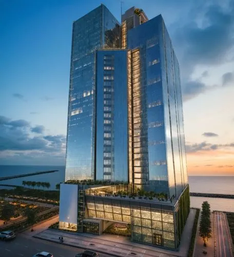 a large building with many windows near the ocean,escala,rotana,qingdao,gdynia,luanda,chengli,Photography,General,Cinematic