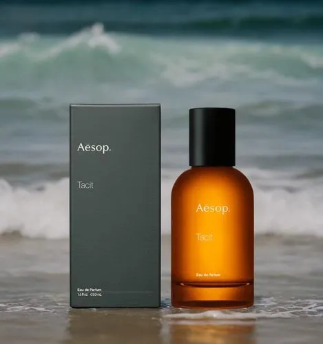 a body of water, water wave, reflection, stardust,an empty bottle sitting next to the ocean,argan,ahava,arcona,chypre,neroli,argan tree