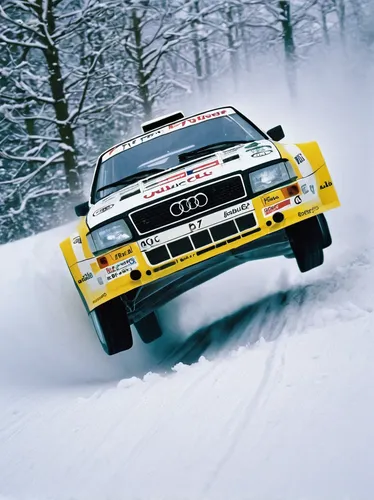 In a suspenseful storyline, describe a race where an Audi Quattro rally car must outmaneuver its competitors to emerge victorious.,audi quattro,audi le mans quattro,audi pikes peak quattro,world rally