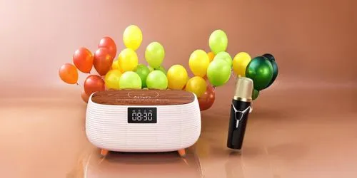 colorful bright sprawling ballons nestled in the middle rises  ,an alarm clock and colorful balloons on the table,pelita,tea light holder,spice grater,cooking utensils,tea candles,torch holder