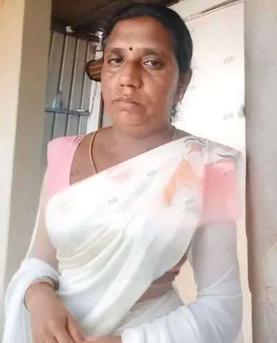 woman in white sari poses for a po,sivakami,rajeswari,shailaja,suseela,shashikala,vasanthi