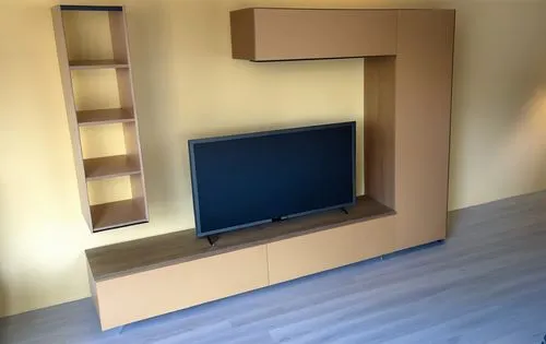 a large tv that is mounted to a wall,tv cabinet,living room modern tv,tv set,plasma tv,schrank,bonus room,Photography,General,Realistic