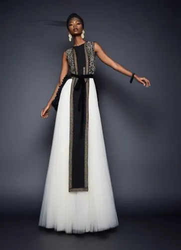 a beautiful woman wearing a black and white gown,a floor-length dress,siriano,makinwa,vionnet,gurira,eveningwear,Photography,Fashion Photography,Fashion Photography 14