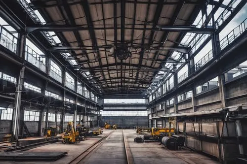 Industrial factory, modern architecture, large steel beams, concrete walls, glass windows, metal pipes, machinery equipment, conveyor belts, catwalks, staircases, control rooms, office spaces, meeting