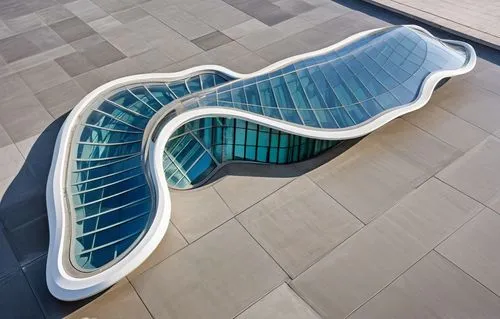 a curved bench sitting on top of a stone floor,etfe,calatrava,futuristic architecture,glass facade,glass roof,futuristic art museum,Photography,General,Realistic