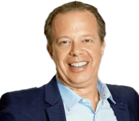 a man in blue shirt and jacket smiling for a camera,varco,popeil,fagerbakke,shandling,tartikoff,keselowski