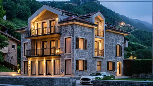 an outdoor area of a building that is lit up with lights,house in mountains,alagna,pontresina,dilijan,house in the mountains,artvin