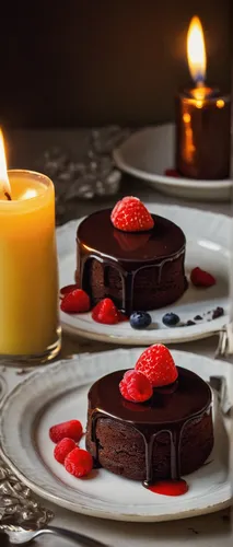 Create a romantic atmosphere with mini chocolate cakes for a candlelit dinner.,black forest cake,chocolate desert,flourless chocolate cake,black forest,sachertorte,mini chocolate cakes,chocolate tarts