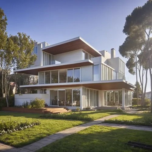 Charming residential house, two-stories with a cozy attic, nestled in a lush green garden, exterior walls painted in soft pastel colors with white trim around the windows and doorframes, a welcoming w