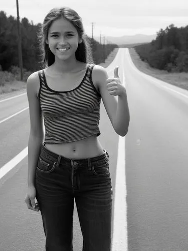 B&W high res photo: A poor-looking young woman stands at the side of the road with her thumb up, hitchhiking.,a woman standing on a highway,hitchhiked,hitchhikes,hitchhike,hitchhiking,hitchhiker,highw