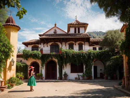 Scene: Catalina de los Rios Catalina de los Ríos y Lisperguer (La Quintrala) from Chile, beautiful, standing facing forward, wearing period clothing, with a wrought iron gate in the background of a ha