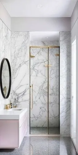 luxury bathroom,modern minimalist bathroom,marble,shower door,shower bar,bathroom,washroom,bathroom cabinet,natural stone,marble palace,shower base,gold stucco frame,almond tiles,contemporary decor,metallic door,polished granite,interior modern design,shower panel,modern decor,hinged doors