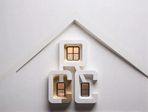 a light box sitting above a white wall,thermostats,homeplug,miniature house,doorbells,smarthome,dolls houses,Photography,General,Realistic