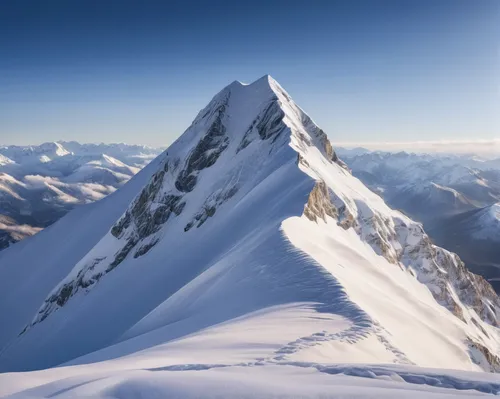 Visualize a tranquil mountain peak covered in a blanket of snow.,breithorn,mitre peak,mont blanc,ortler winter,schilthorn,aiguille du midi,top mount horn,arlberg,ortler,cosmiques ridge,eggishorn,weiss