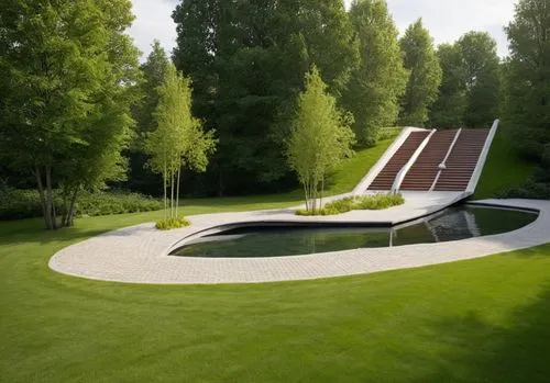 a landscaped area with a curved, curving pool and grass field next to trees,k13 submarine memorial park,water feature,swim ring,reflecting pool,corten steel,infinity swimming pool,Photography,General,