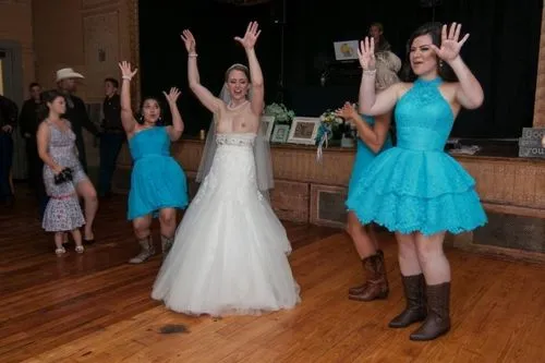 dress,several brides and guests dancing on wooden floors,wedding dress train,debutantes,square dance,foundresses,brides,wedding reception