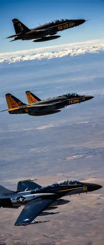 "Capt. Mark ""Mutha"" Hubbard pilots the F-6F Hellcat with Lt. Matt ""11"" Lowe in the F/A-18E and Lt. Erik ""Dookie"" Kenny in the F/A-18F over California's Central Valley during the 2011 USN Tailhoo