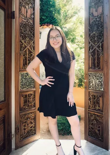 entrada de una casa,plus-size model,senior photos,social,a girl in a dress,garden door,quinceañera,wooden door,church door,antique background,steel door,black dress with a slit,open door,portrait back