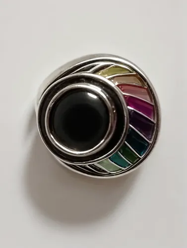 Make colorful designs,colorful ring,circular ring,titanium ring,enamelled,brooch,ring with ornament,isolated product image,ring jewelry,saturnrings,finger ring,glass bead,cufflink,lacquer,color circle