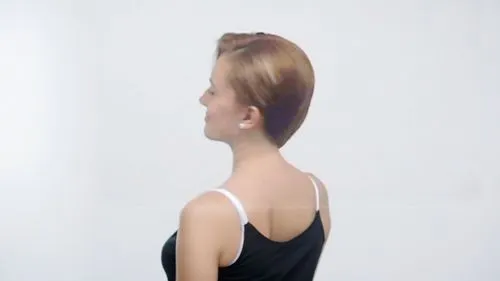 beautiful woman in black t-shirt,a woman in a black tank top is looking off into the distance,shoulder length,undercut,sternocleidomastoid,back of head,girl in a long dress from the back,updo