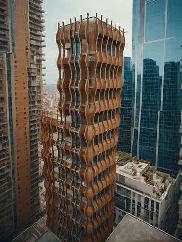 a tall building that has an unusual design on it,building honeycomb,antilla,renaissance tower,escala,honeycomb structure,kimmelman,Photography,General,Cinematic