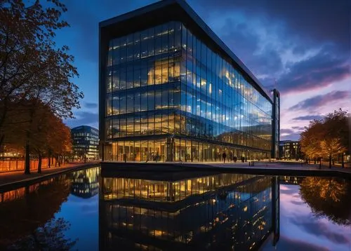 Modern architecture, futuristic building, Greater Manchester, urban cityscape, steel and glass structure, sleek lines, minimalist design, LED lights illuminating the façade, evening shot, dramatic sha