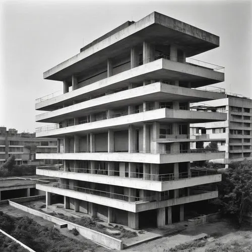 Modernist architectural style, Le Corbusier's Five Points, Pilotis, free plan, functionalism, rectangular shape, reinforced concrete, white walls, strip windows, roof garden, ramps, functional simplic