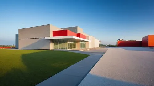 The overall composition is balanced, with the performing arts center as the central focus.
The combination of modern architectural elements, warm lighting, vibrant colors and human activity creates an