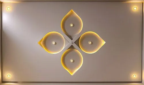 Gypsum decoration in the ceiling of a room with hidden LED lighting,a large white light is in front of a white wall,fleur de lis,fleur de lys,circular star shield,lotus png,solar plexus chakra,gold sp