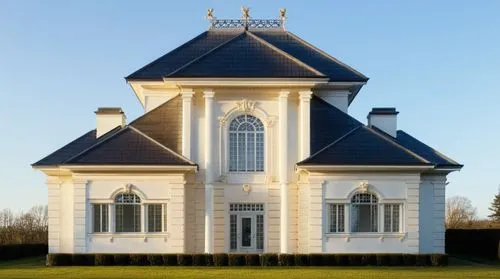 Beautiful exterior. Two-story neoclassical house with hipped roof, white brick and gray tiles, with three large windows on the front facade and one door at ground level.,a large white house with dark 