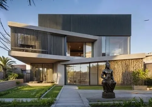 BRONZE AFRICAN WARIOR STATUE,modern house,modern architecture,dunes house,landscape design sydney,cube house,smart house,landscape designers sydney,garden design sydney,contemporary,cubic house,cube s