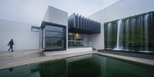 aqua studio,cubic house,water wall,cube house,modern house,mirror house