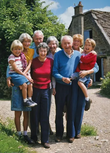 Write a heartwarming story about a family's reunion in a small village.,parsley family,poppy family,pensioners,group of people,grandchildren,grandparents,yew family,parents with children,legume family