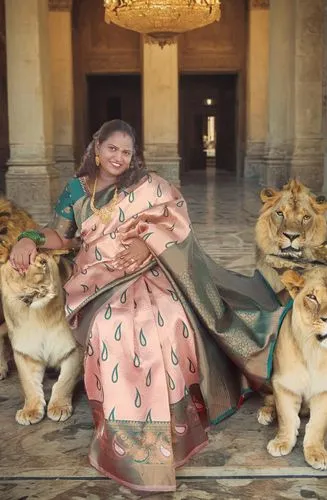 sitting in between group of lions as a royal queen in a palace




,she feeds the lion,rajah,royal bengal,dynasties,kanimozhi,maharani,jayalalitha,lionizing,barkha,khaleda,kattabomman,lionesses,brazil