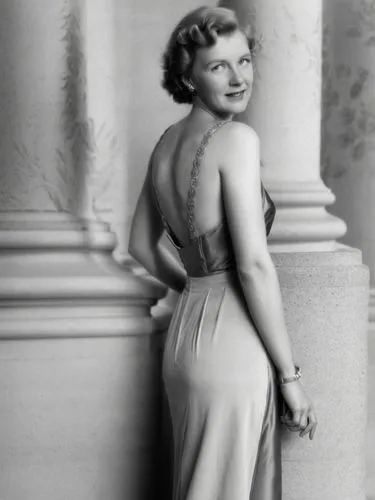 A lady from the 1940s in front of a classical column.,an older woman leaning against a pillar and wearing a dress,claire trevor,greer garson-hollywood,hayworth,desilu,stanwyck,myrna,Photography,Black 