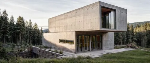 cubic house,dunes house,modern architecture,cube house,metal cladding,timber house,modern house,corten steel,house in the mountains,house in mountains,exposed concrete,eco-construction,mirror house,as