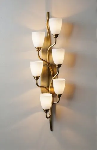 wall sconce 
with textures white glass
finish in antique brass
with candelabra bulb
with back plate same as on picture
,a sconce with many lights and white glass shades,ensconce,wall lamp,sconce,wall 