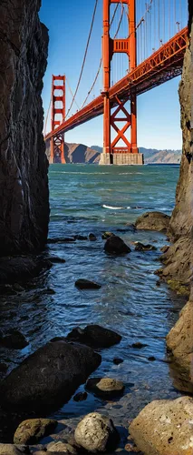 View of Golden Gate bridge from rocky shoreline,the golden gate bridge,golden gate,goldengatebridge,golden gate bridge,golden bridge,spit bridge,three point arch,narrows,golden gate bridge golden gate