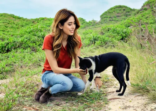 Create a heartwarming story where Blanca Suarez befriends a stray dog on a deserted island.,girl with dog,pet vitamins & supplements,vietnamese woman,thai bangkaew dog,asian semi-longhair,dog hiking,y