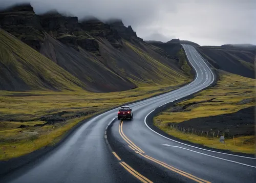 It may be tempting to speed on Iceland's empty roads, but there are plenty of speeding cameras that will catch you.,eastern iceland,winding roads,iceland,mountain highway,winding road,mountain road,st