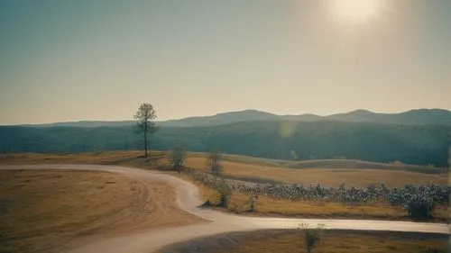 alpine drive,winding road,mountain road,open road,winding roads,dirt road,lassen volcanic national park,the road,salt meadow landscape,landscape background,pikes peak highway,rolling hills,dji spark,a