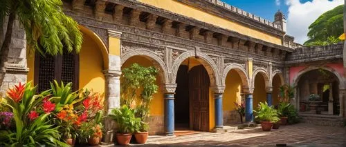 Colorful Guatemalan architecture, vibrant colonial-style building, intricate stone carvings, ornate wooden doors, bright ceramic tiles, rustic stone walls, curved arches, grand entrance, lush greenery