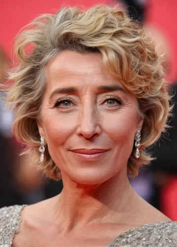 Emma Thompson went the au naturel makeup route but didn't skimp on her perfectly tousled curls.,blue jasmine,british actress,female hollywood actress,maria laach,queen cage,physiognomy,aging icon,shor