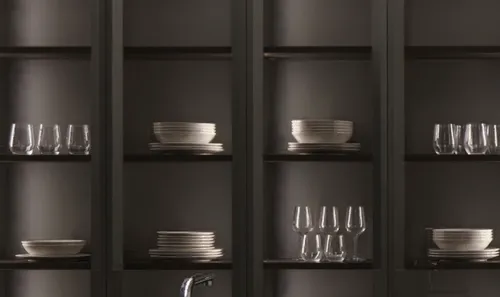 under-cabinet lighting,serveware,kitchenware,tableware,barware,plate shelf,silver cutlery,dishware,cookware and bakeware,dark cabinets,dark cabinetry,glasswares,shelving,glassware,stemware,dinnerware set,kitchen utensils,dish storage,cupboard,glass containers